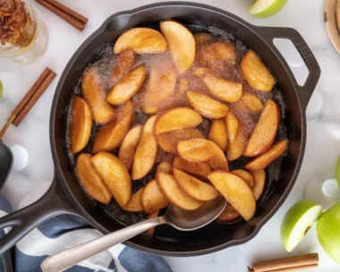 Bowl of Southern Fried Apples cooked in butter and cinnamon, a delicious dessert.