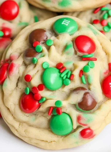 Delicious M&M Christmas Cookies with vibrant red and green candy pieces.