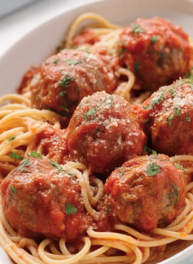Delicious homemade meatballs in a rich sauce, perfect for pasta dishes.