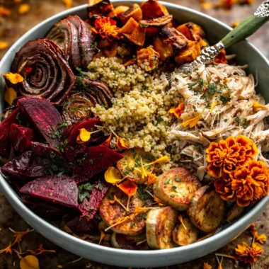 Healthy Quinoa Bowl with Roasted Winter Vegetables served in a white bowl.