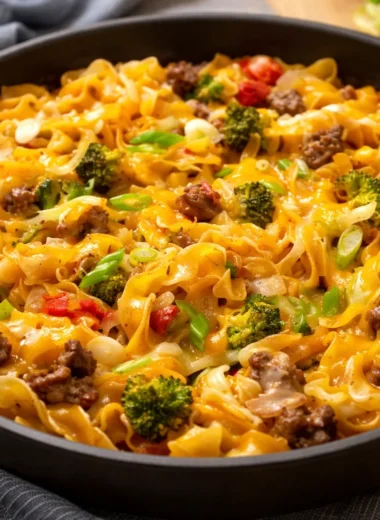 One-Pot Beef and Noodle Skillet with ground beef, egg noodles, and cheddar cheese.