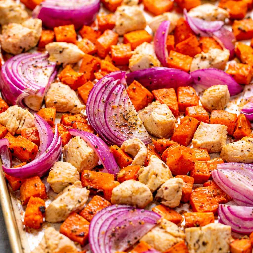 Delicious sheet pan chicken and sweet potatoes dinner ready in 30 minutes.