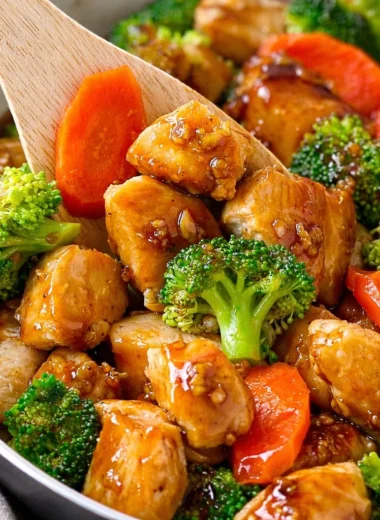 Honey Garlic Chicken Stir Fry with chicken, broccoli, and carrots in a sweet-savory sauce.