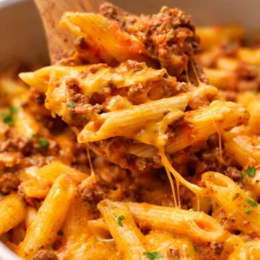 Cheesy Mexican ground beef casserole dish with rice, perfect for family meals.