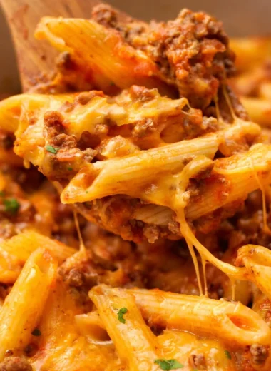 Cheesy Mexican ground beef casserole dish with rice, perfect for family meals.