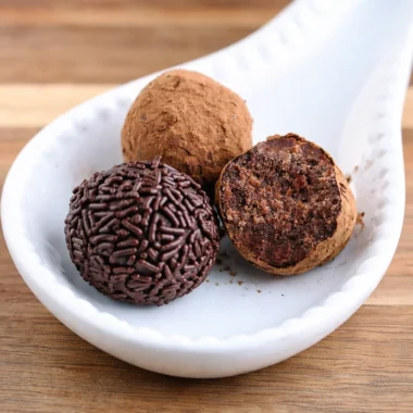 Deliciously Easy Traditional German Rum Balls Recipe (Rumkugeln) 38 Delicious traditional German Rum Balls (Rumkugeln) decorated with chocolate sprinkles.