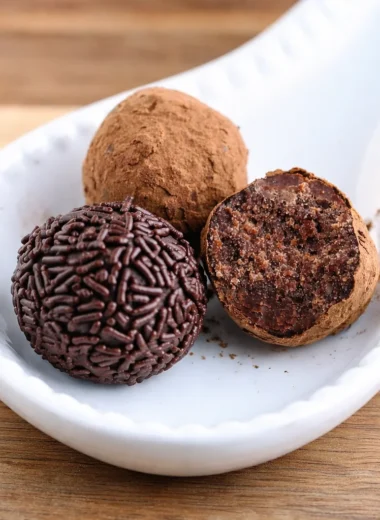 Delicious traditional German Rum Balls (Rumkugeln) decorated with chocolate sprinkles.
