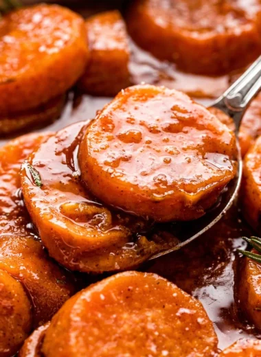 Delicious baked sweet potatoes served with a colorful garnish