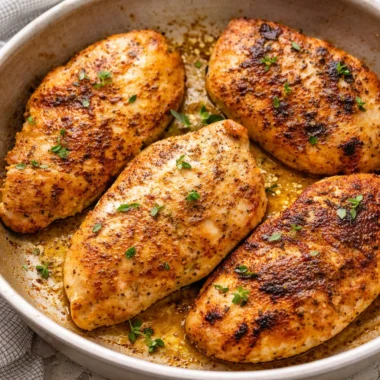 Juicy and tender chicken breasts cooked to perfection using various methods.