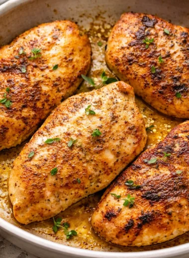 Juicy and tender chicken breasts cooked to perfection using various methods.