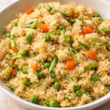 Quick and Delicious Stir Fry and Rice Recipe for Busy Nights 37 Quick stir fry and rice recipe with colorful vegetables in a wok.