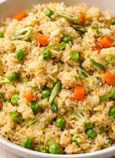 Quick stir fry and rice recipe with colorful vegetables in a wok.