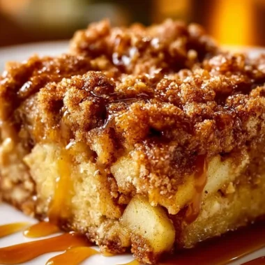 Super easy apple crisp coffee cake topped with crunchy oat topping