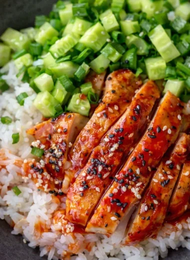 Delicious Korean Gochujang Chicken Rice Bowl with fresh vegetables and spicy sauce