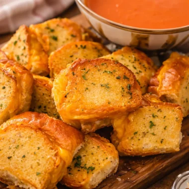 Mini Grilled Cheese Hawaiian Rolls with melted cheese and crispy edges.