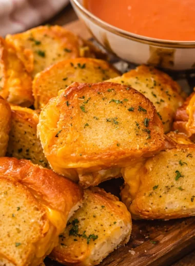 Mini Grilled Cheese Hawaiian Rolls with melted cheese and crispy edges.