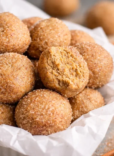 No-bake Snickerdoodle Protein Balls with cinnamon and nut butter, perfect for a healthy snack.