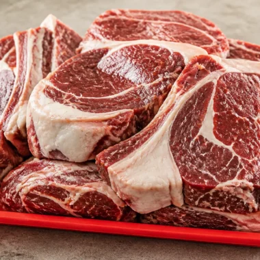 Fresh Raw Meat On Red Tray 28 Fresh raw meat displayed on a red tray for culinary inspiration