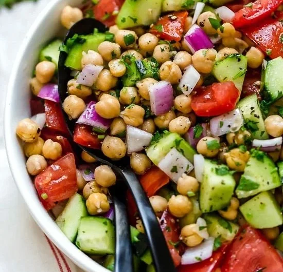 Crispy Chickpea Salad with cucumbers and tomatoes in a bowl