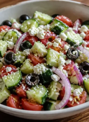 Fresh Mediterranean cucumber tomato salad with herbs and dressing